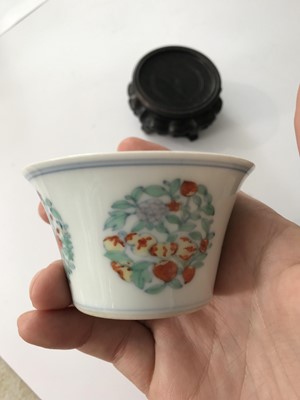 Lot 330 - A CHINESE DOUCAI CUP.