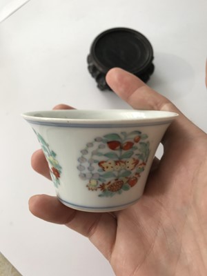 Lot 330 - A CHINESE DOUCAI CUP.
