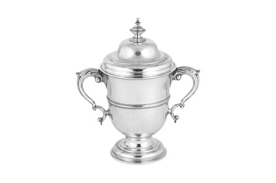 Lot 695 - A George II sterling silver twin handled cup and cover, London 1749 by Fuller White (reg. 31st Dec 1744)