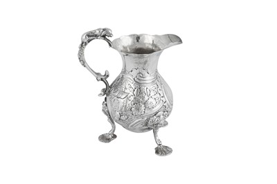 Lot 635 - A George II sterling silver cream jug, London 1756 by W.? probably Walter Brind
