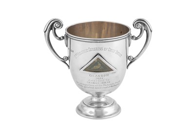 Lot 474 - Philately interest – A George V sterling silver twin handled presentation cup, London 1923 by Searle & Co