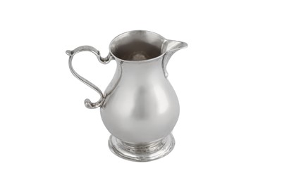 Lot 656 - A George II sterling silver ‘sparrow beak’ cream jug, London 1743 by William Garrard (first reg. 1st April 1735)