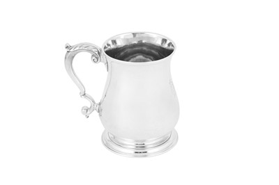 Lot 670 - A George II sterling silver pint mug, London 1743 by Henry Brind (reg. 6th May 1742)