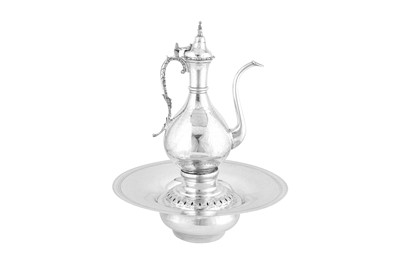 Lot 251 - A large late 19th century / early 20th century Egyptian unmarked silver coffee pot and warming stand, probably Cairo circa 1900