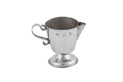 Lot 685 - A Queen Anne Britannia standard silver miniature or ‘toy’ ewer, London 1708, makers mark obscured but probably George Manjoy