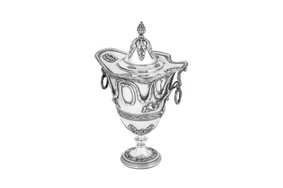 Lot 500 - An Edwardian sterling silver twin handled covered vase or cup, London 1907 by George Fox