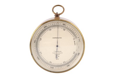 Lot 353 - A BRITISH MILITARY SURVEYING ANEROID BAROMETER BY T WHEELER, 1940