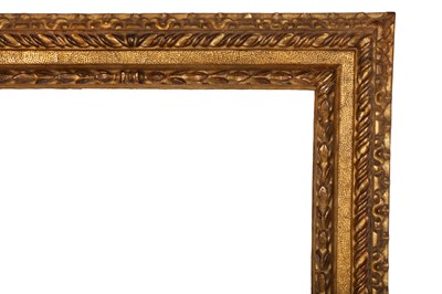 Lot 105 - AN ITALIAN 17TH CENTURY CARVED AND GILDED REVERSE CASSETTA FRAME