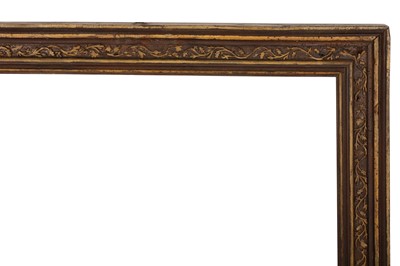 Lot 117 - AN ITALIAN LATE 18TH CENTURY CARVED AND PARCEL GILT CASSETTA FRAME