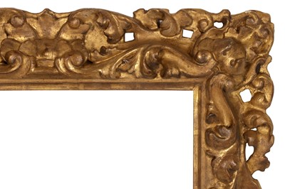 Lot 106 - AN ITALIAN FLORENTINE 17TH CENTURY CARVED, PIERCED AND GILDED REVERSE SECTION FRAME