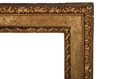 Lot 113 - AN ITALIAN 17TH CENTURY CARVED, GILDED AND PUNCHED CASSETTA FRAME
