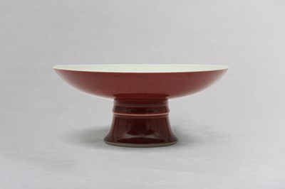 Lot 104 - A CHINESE COPPER RED-GLAZED STEM DISH.