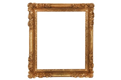 Lot 134 - A FRENCH LOUIS XIV CARVED AND GILDED LEBRUN STYLE FRAME