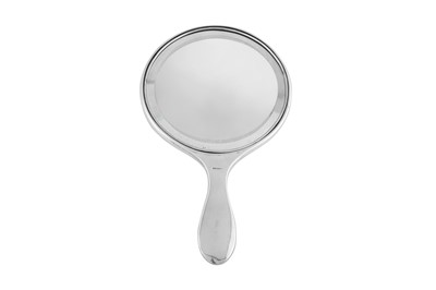 Lot 123 - An early 20th century Anglo - Indian silver hand mirror, Calcutta circa 1920