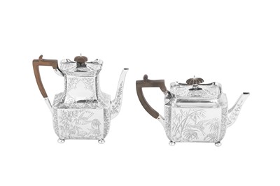 Lot 540 - A Victorian sterling silver ‘aesthetic movement’ four-piece bachelor tea and coffee service on tray, London 1888/92/93 by messrs Barnard