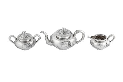 Lot 235 - An early 20th century Chinese Export silver three-piece tea service on a twin handled tray, Shanghai dated 1926 retailed by Zee Woo