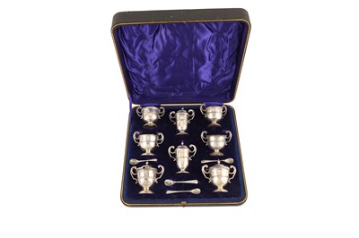 Lot 488 - A cased Edwardian sterling silver eight-piece cruet set, Sheffield 1909 by Robert Fead Mosley and Co