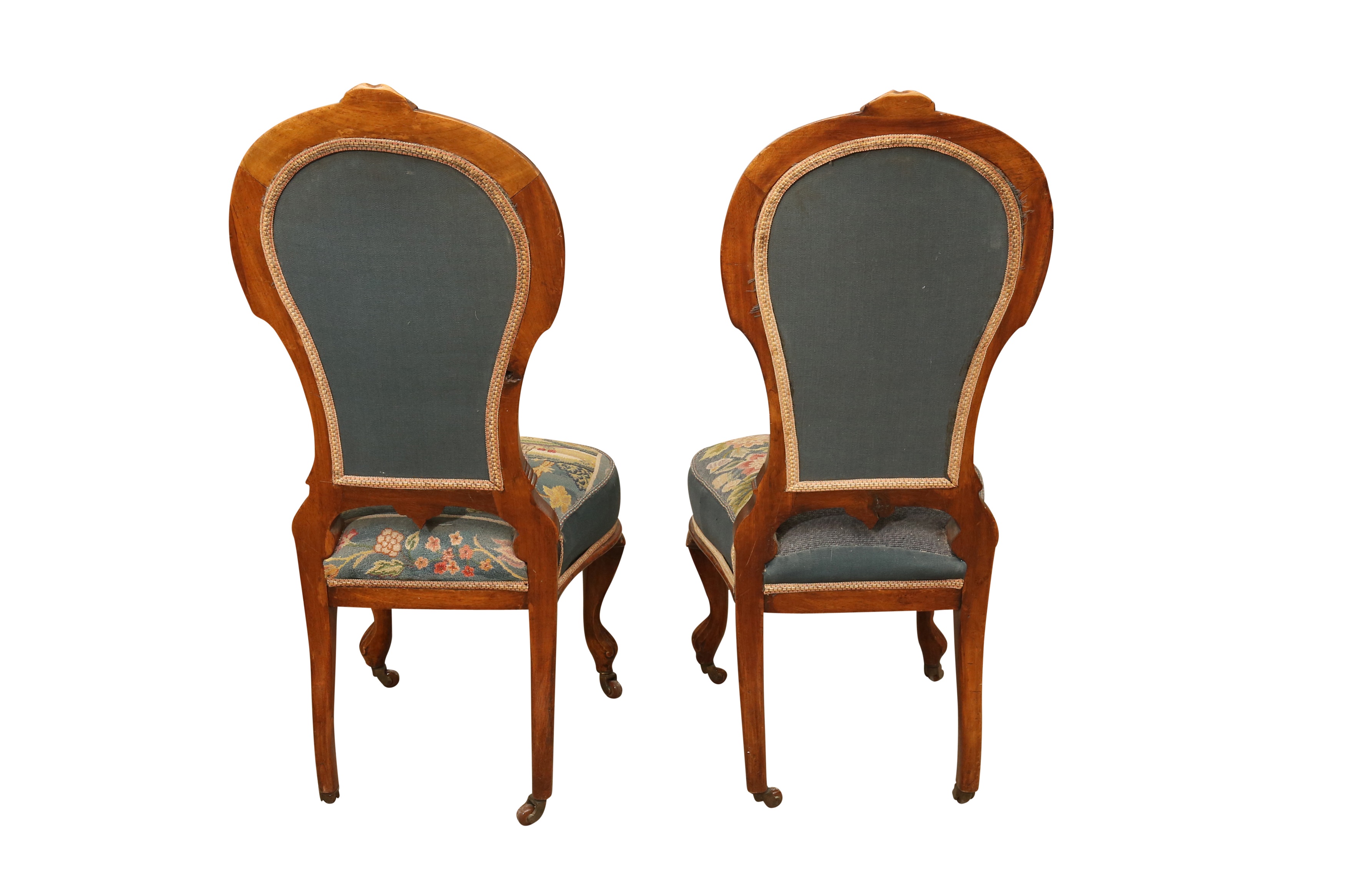 Lot 186 A PAIR OF VICTORIAN WALNUT NURSING CHAIRS,