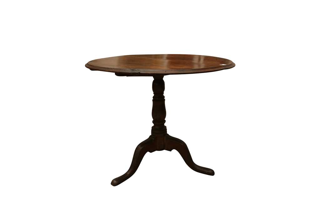 Lot 169 - A GEORGE III OAK SUPPER TABLE