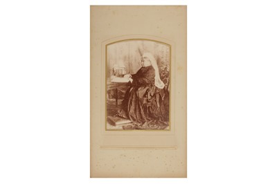 Lot 27 - ALBUM CONTAINING A COLLECTION OF CABINET CARDS