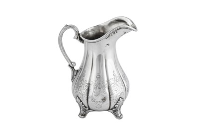 Lot 503 - A Victorian sterling silver milk jug, Sheffield 1850 by James Dixon & Son