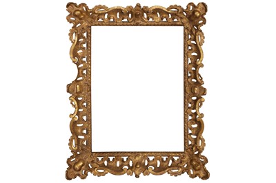 Lot 140 - AN ENGLISH 19TH / 20TH CENTURY CHIPPENDALE STYLE CARVED, PIERCED AND GILDED SWEPT FRAME
