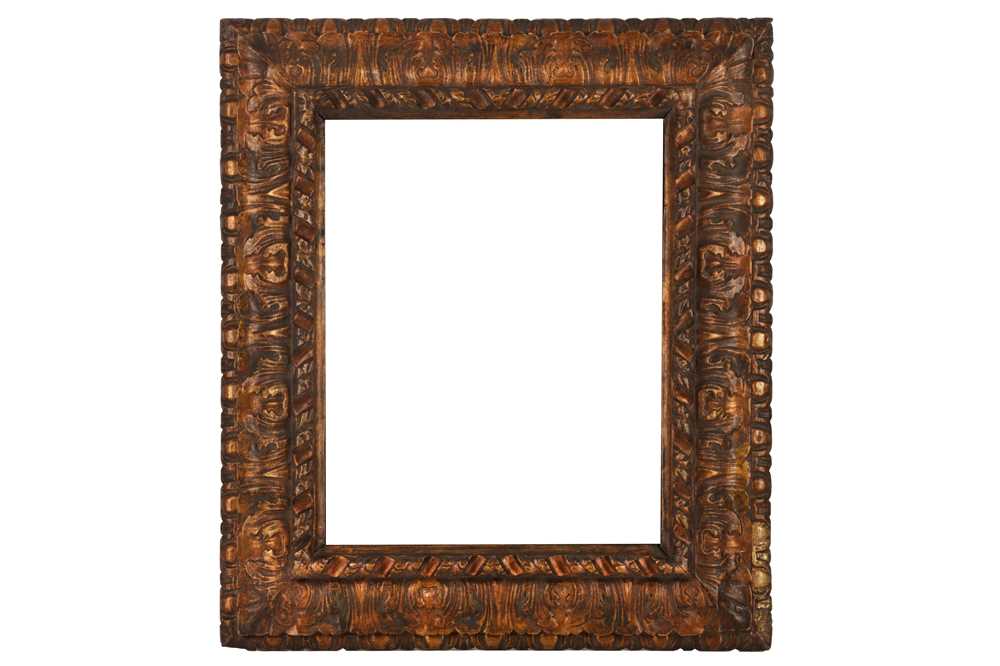 Lot 109 - AN ITALIAN BOLOGNESE 17TH CENTURY STYLE CARVED, GILDED AND STAINED REVERSE PROFILE FRAME