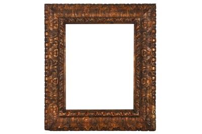 Lot 109 - AN ITALIAN BOLOGNESE 17TH CENTURY STYLE CARVED, GILDED AND STAINED REVERSE PROFILE FRAME