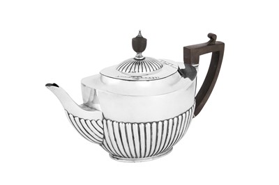 Lot 470 - A George V sterling silver teapot, London 1910 by William Hutton and Sons