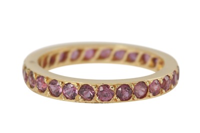 Lot 193 - A ruby eternity ring