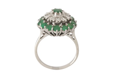Lot 172 - A diamond and emerald cluster ring
