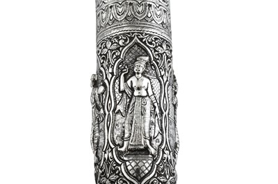 Lot 171 - A very large early 20th century Burmese silver scroll holder, probably Rangoon circa 1920
