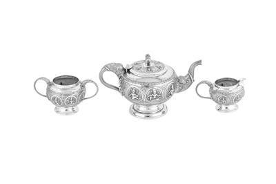 Lot 117 - An early 20th century Anglo – Indian unmarked silver three-piece tea service, Madras circa 1920