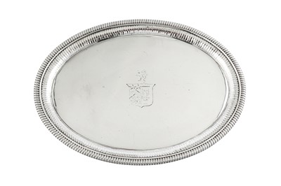 Lot 619 - A pair of George III sterling silver salvers, London 1801 by Thomas Hannam and John Crouch II (reg. 13th May 1799)