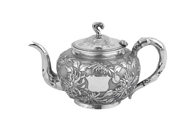 Lot 230 - An early 20th century Chinese Export silver three-piece tea service, Shanghai circa 1920 retailed by Zee Wo