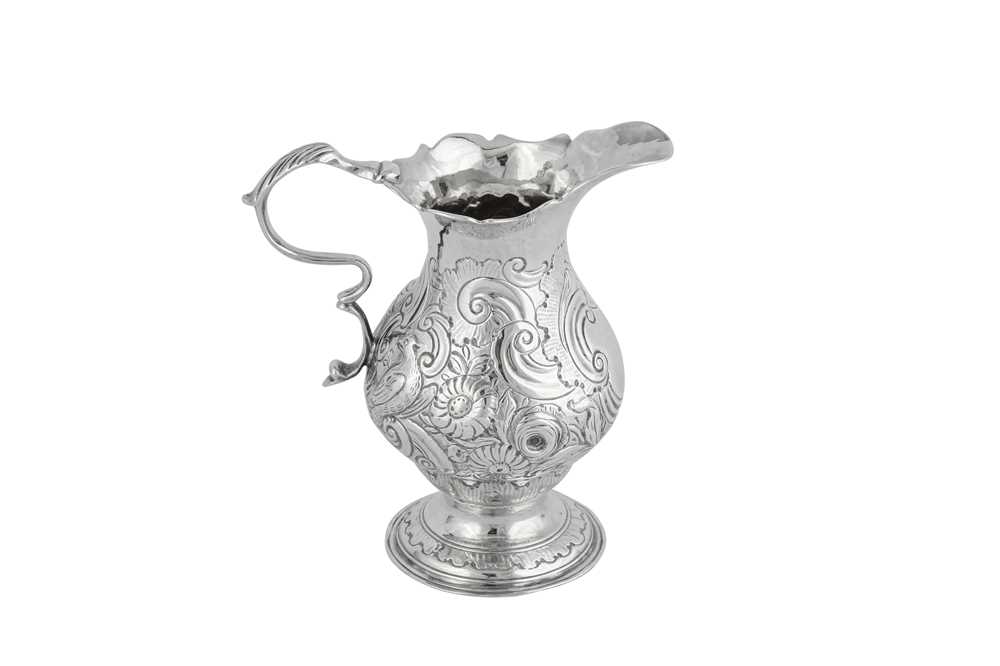 Lot 655 - A George II sterling silver cream jug, London 1751 by Samuel Meriton I (first reg. 10th May 1739)