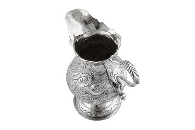 Lot 655 - A George II sterling silver cream jug, London 1751 by Samuel Meriton I (first reg. 10th May 1739)