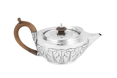 Lot 593 - A George III sterling silver teapot, London 1800 by John Robins