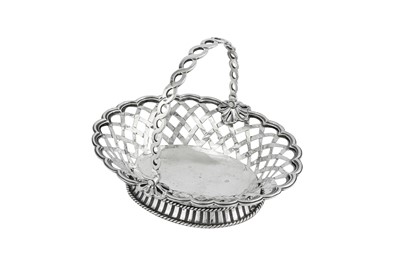 Lot 660 - A George II sterling silver sweetmeat basket, London 1755 by Samuel Herbert and Henry Bailey  (reg. 6th Nov 1750)