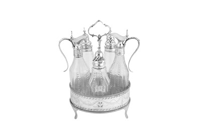 Lot 624 - A George III sterling silver five bottle cruet, London 1785 by Hester Bateman