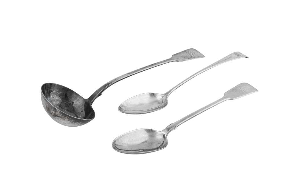 Lot 396 - A Victorian sterling silver soup ladle and basting spoons, London 1869 by George Adams of Chawner and Co