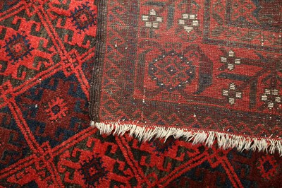 Lot 448 - AN ANTIQUE BALOUCH RUG, NORTH-EAST PERSIA