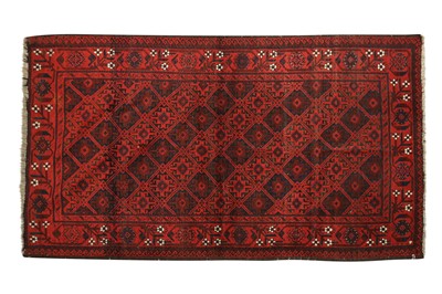 Lot 448 - AN ANTIQUE BALOUCH RUG, NORTH-EAST PERSIA