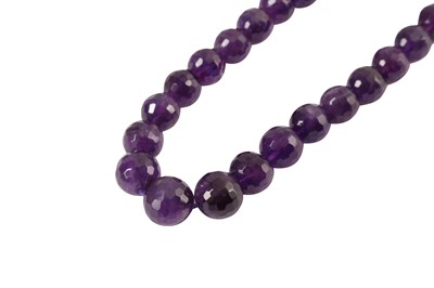 Lot 222 - An amethyst bead necklace