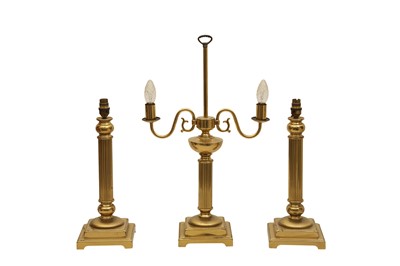 Lot 300 - A SET OF THREE BRASS TABLE LAMPS