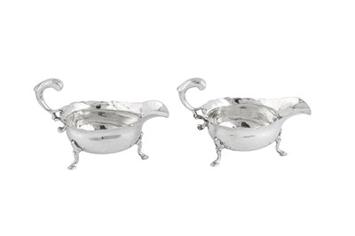 Lot 659 - A pair of George II sterling silver sauce boats, London 1748 by John Pollock (this mark reg. 26th June 1739)