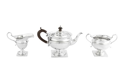 Lot 471 - A George V sterling silver three-piece bachelor tea service, Birmingham 1910 by Williams Birmingham Ltd