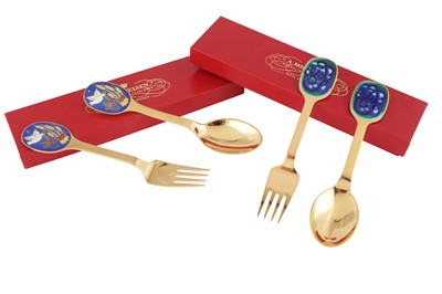 Lot 120 - TWO BOXED SETS OF DANISH STERLING SILVER GILT AND ENAMEL YEAR SPOONS AND FORKS, BY ANTON MICHELSEN