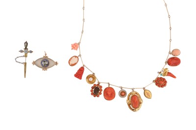 Lot 230 - A CORAL CHARM NECKLACE