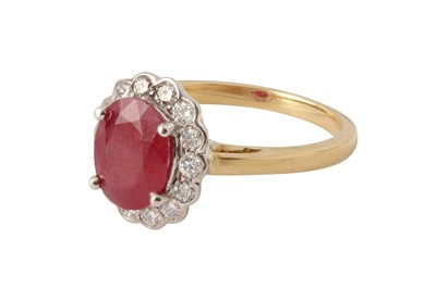 Lot 190 - A ruby and diamond cluster ring